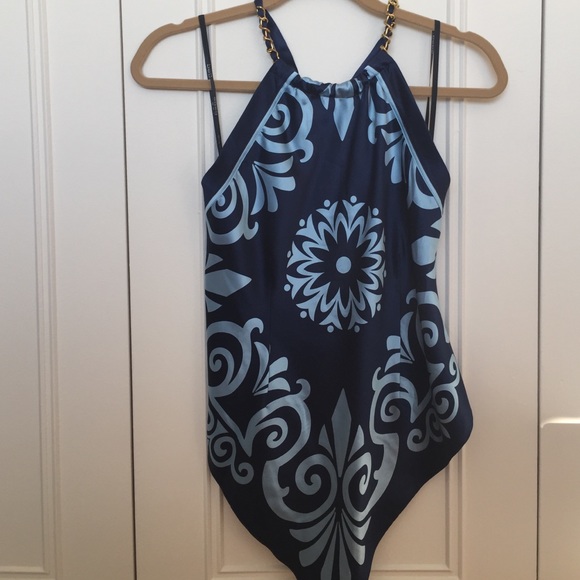 Bebe tank top with open back. New with tags