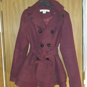 Celebrity Pink skirted jacket with removable hood.