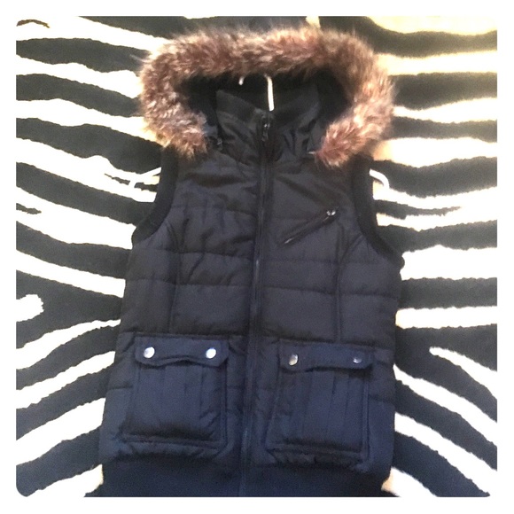 Black down vest with fake fur hood. Women's M.
