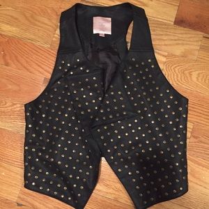 faux leather vest with gold studs
