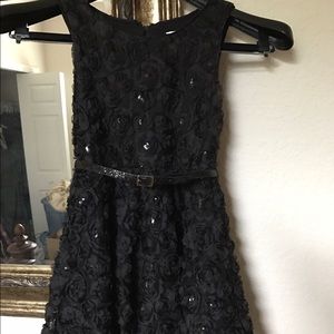 Justice black dressy dress sparkly belt.