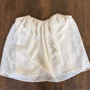 Urban Outfitters polka dot sleeveless top.