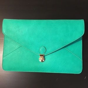 Turquoise clutch by Street Level.