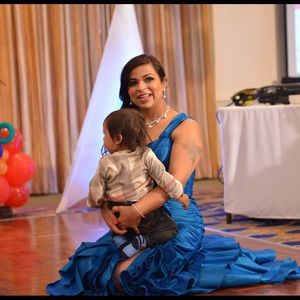 Jovani Gown with Rosettes and ruffles teal color