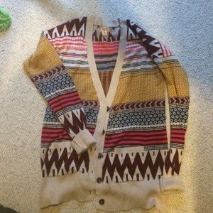 Never worn -Funky button up V neck sweater