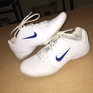 White cheer shoes with interchangeable Nike sign
