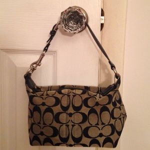 Black and white Coach purse