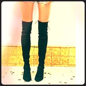 Black thigh high boots. Trending right now!