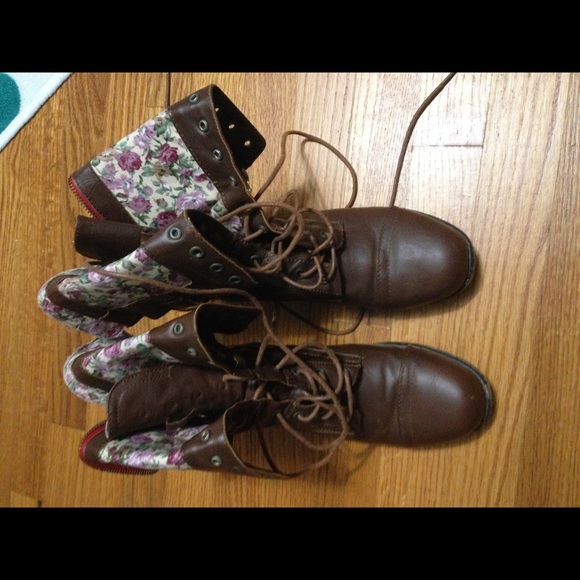 Brown combat boots with floral detail