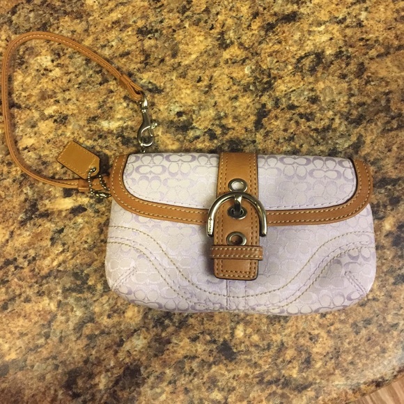 Light pink Coach wristlet