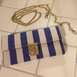 Clutch with detachable gold chain strap