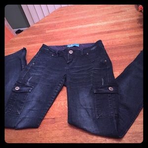 Distressed skinny blue jeans