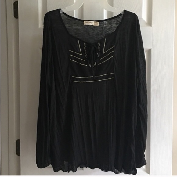 Black top with gold embellishments