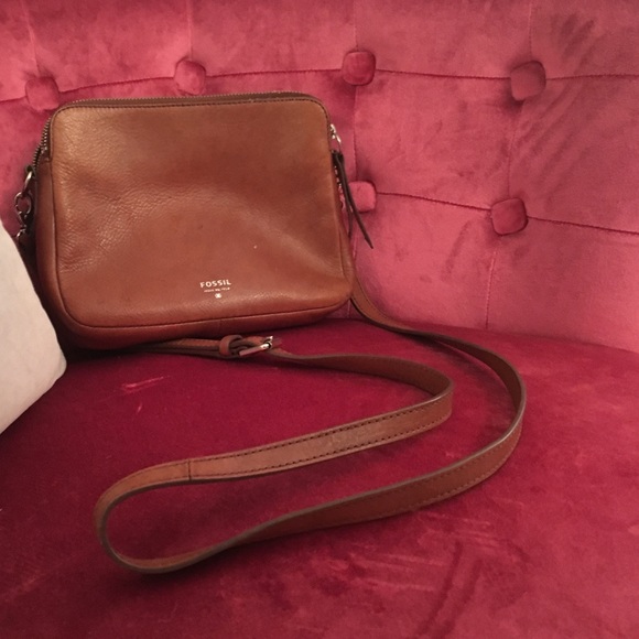 Small tan fossil cross body