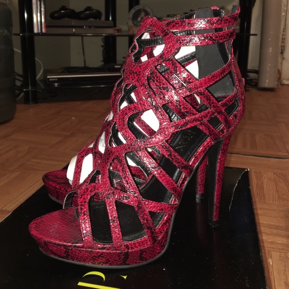 Platform snakeskin strapped red heeled sandals
