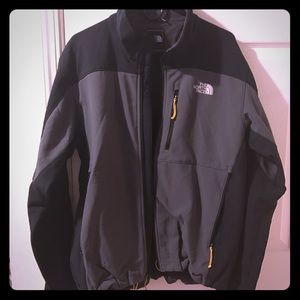Black and gray zip up athletic jacket
