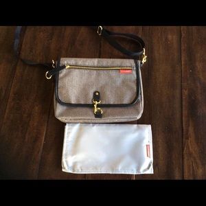 Skip Hop cross body bag with changing pad