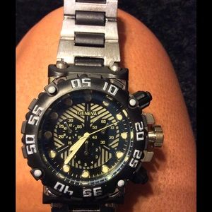 Brand new men's stainless steel blk/slvr watch.