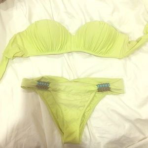 Despi lime green suit.