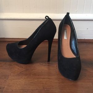 Black suede pumps