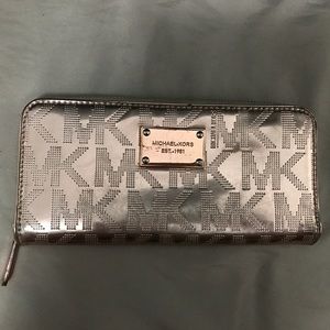 Michael Kors Rose Gold zippered wallet