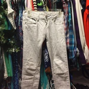 White snakeskin skinny jeans