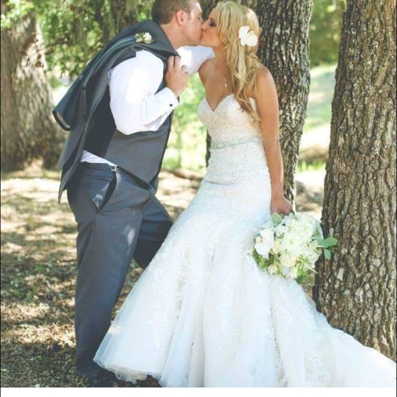 Beautiful Last season Allure Wedding Dress.