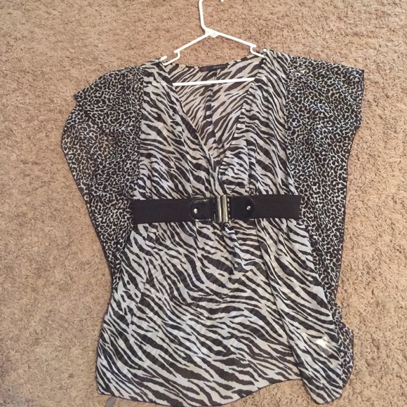 Sheer animal print blouse.