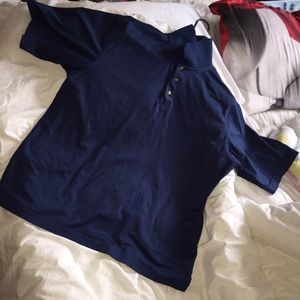 Large blue men's Kirkland performance polo shirt