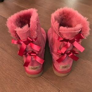 Pink Ugg Boots with ribbon bows in back