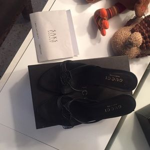 Gucci opened toe sandals.