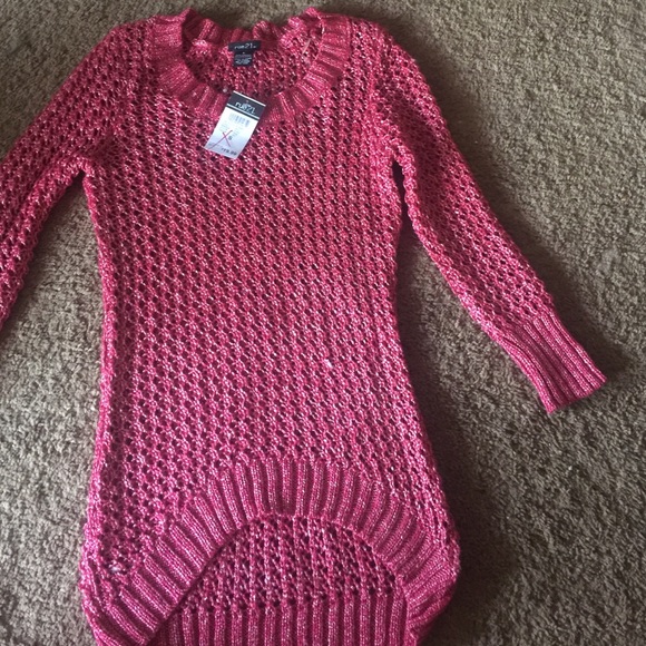 Pink see through sweater.