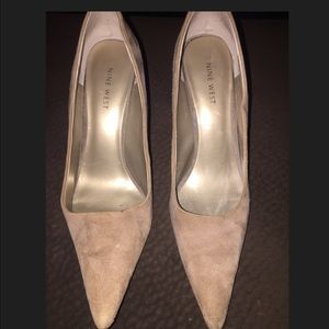 Pointy suede high heels.