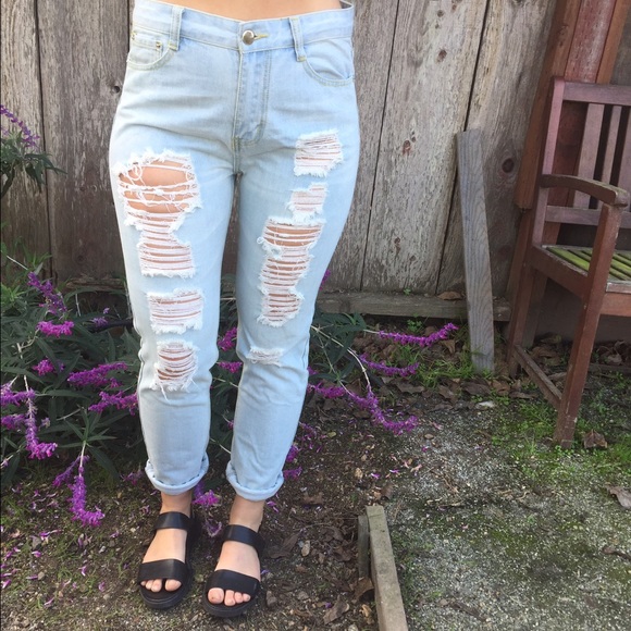 Light wash destroyed boyfriend jeans