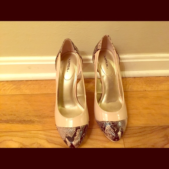 Nude and snakeskin print heels