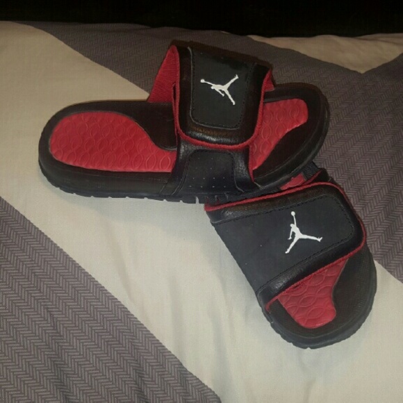 Black and red Jordan sandals