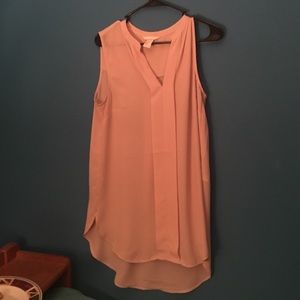 Sleeveless light pink blouse