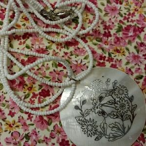 Sea shell engraved necklace