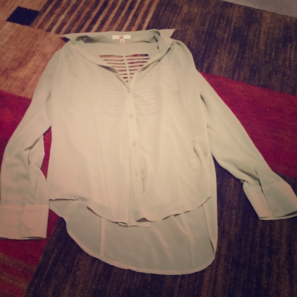 Mint green blouse with cut out in back