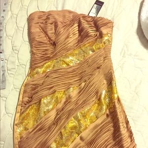 Strapless new with tags gold dress.