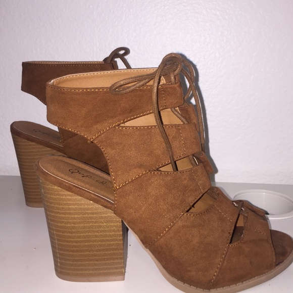 Brown suede heeled booties w cutouts