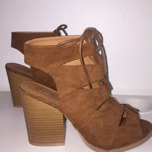 Brown suede heeled booties w cutouts
