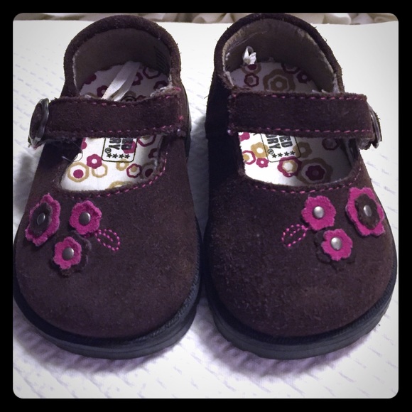 Brown suede Mary Janes.