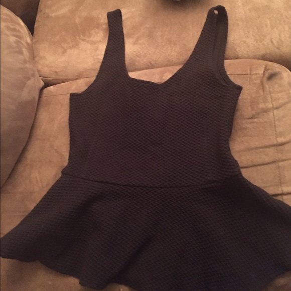Anthropologie black peplum top XS