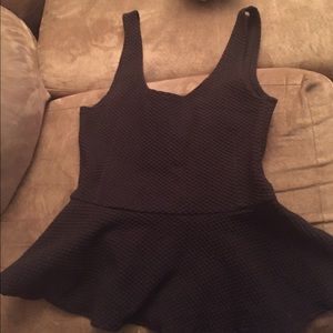 Anthropologie black peplum top XS