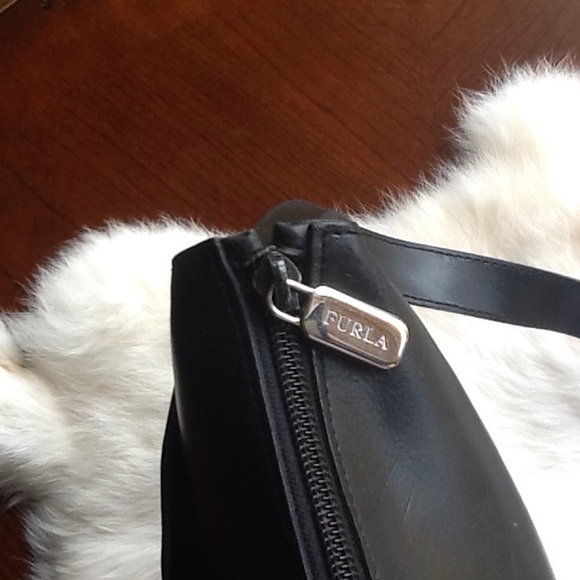 Small furla purse black.