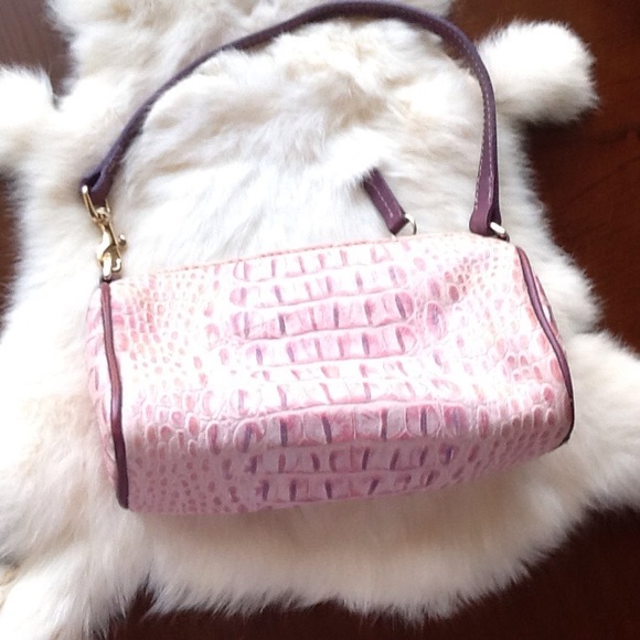 Dooney Bourke small purple purse.