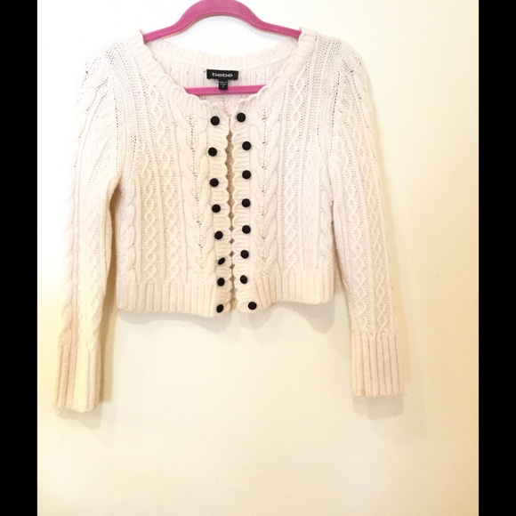 BeBe sweater ,with black buttons.
