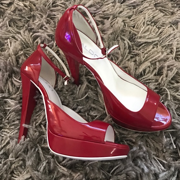 Sky high peep toe pumps