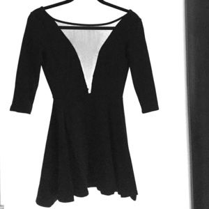 Black scoop-back dress with front mesh plunge